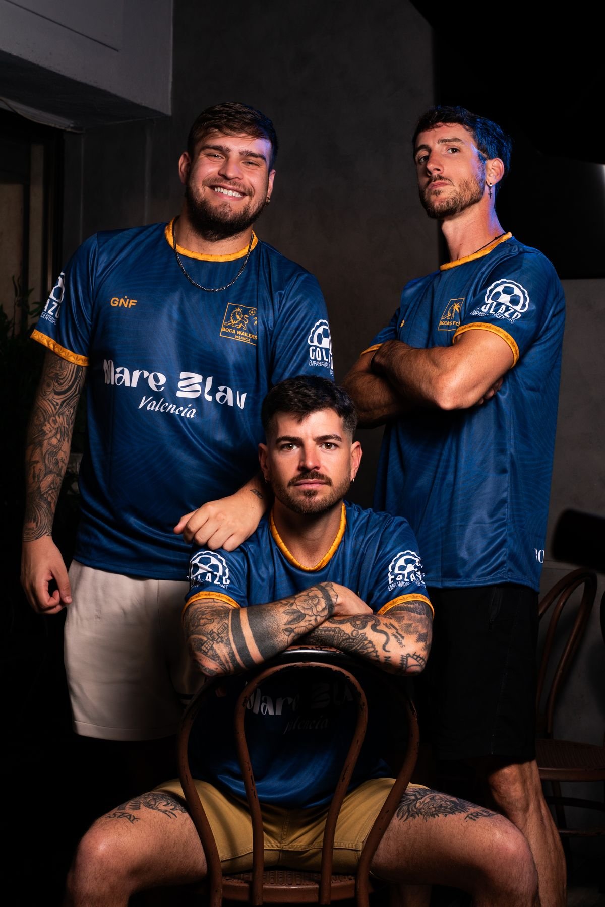 Tres jugadores posando juntos