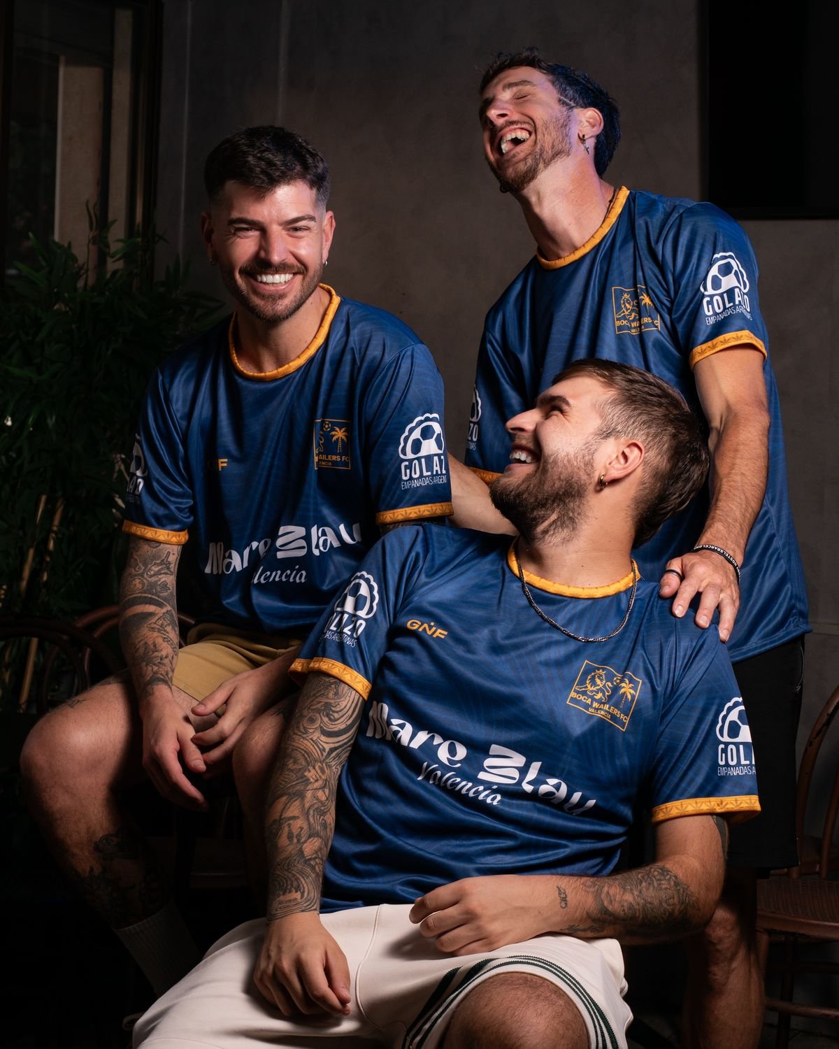 Tres jugadores riendo